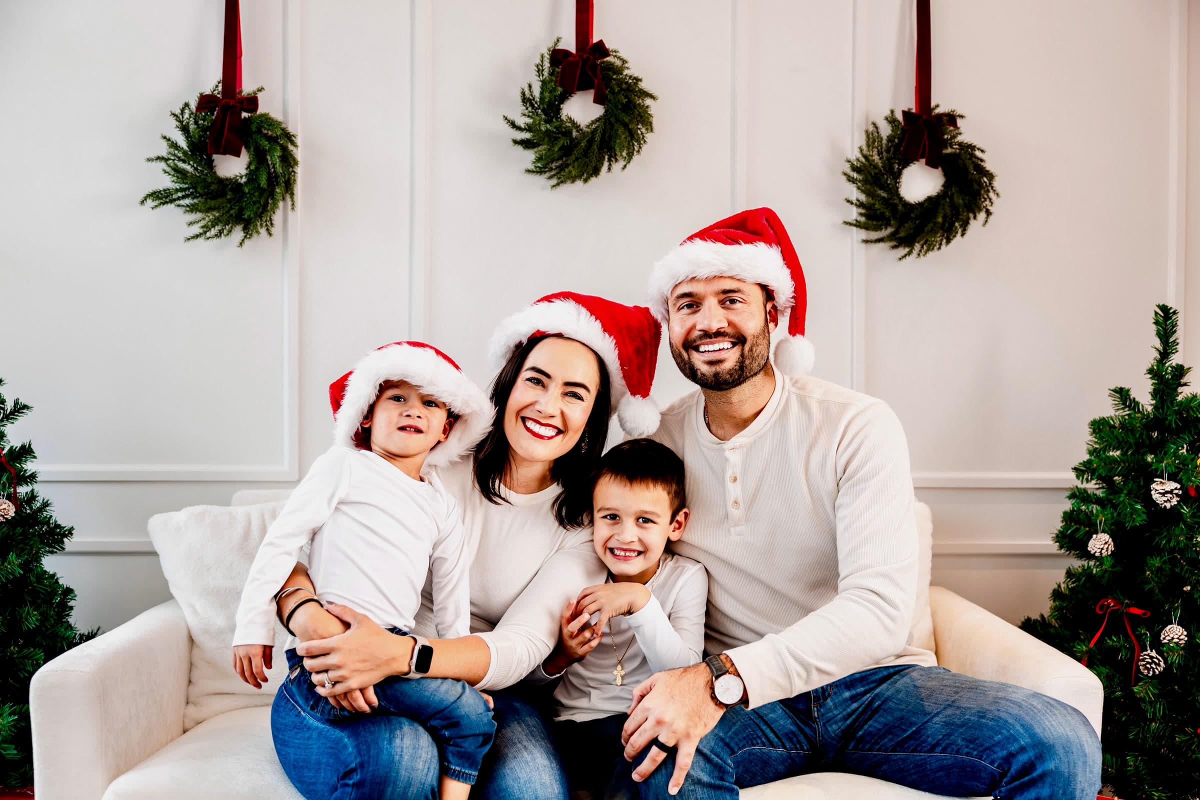 Dr. Rad, Stevan, Luka, and Maxim in matching Santa hats for the holidays