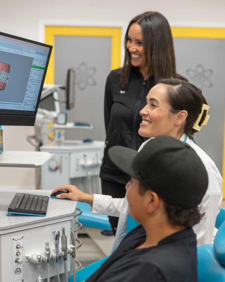 Dr. Rad and a patient reviewing a digital 3D scan at ION Orthodontics in Port St. Lucie