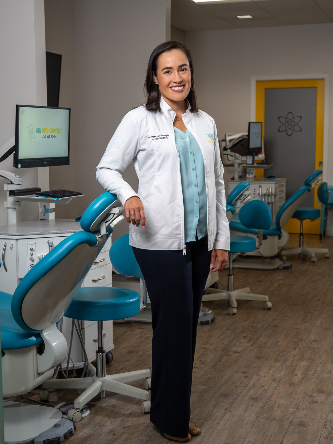 Dr. Marcela Radojevic, board-certified orthodontist, in the ION Orthodontics treatment bay in Port St. Lucie
